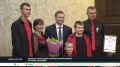 Четыре сына, медали и указ президента: семья Поповых из Майны получила орден "Родительская слава"